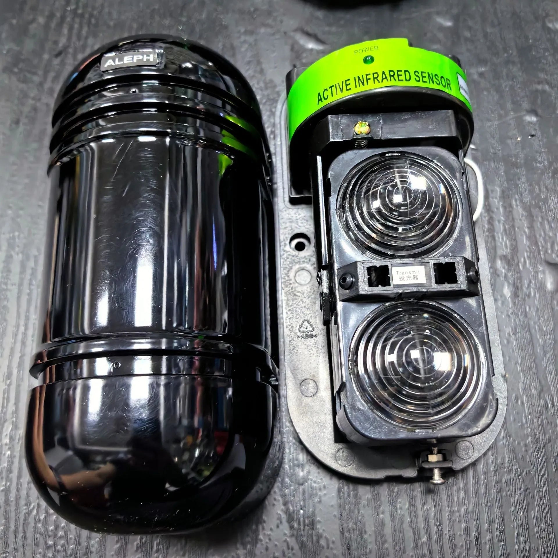 Black two-beam infrared anti-theft detector with wired connections for 150 metre security coverage