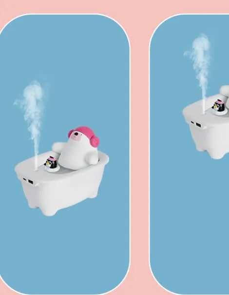 White plastic USB air humidifier with water tank on a desk