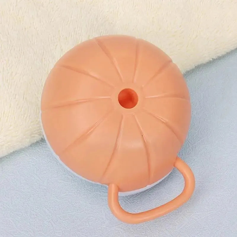 Orange TPR dog bath brush with shampoo dispenser and massage bristles