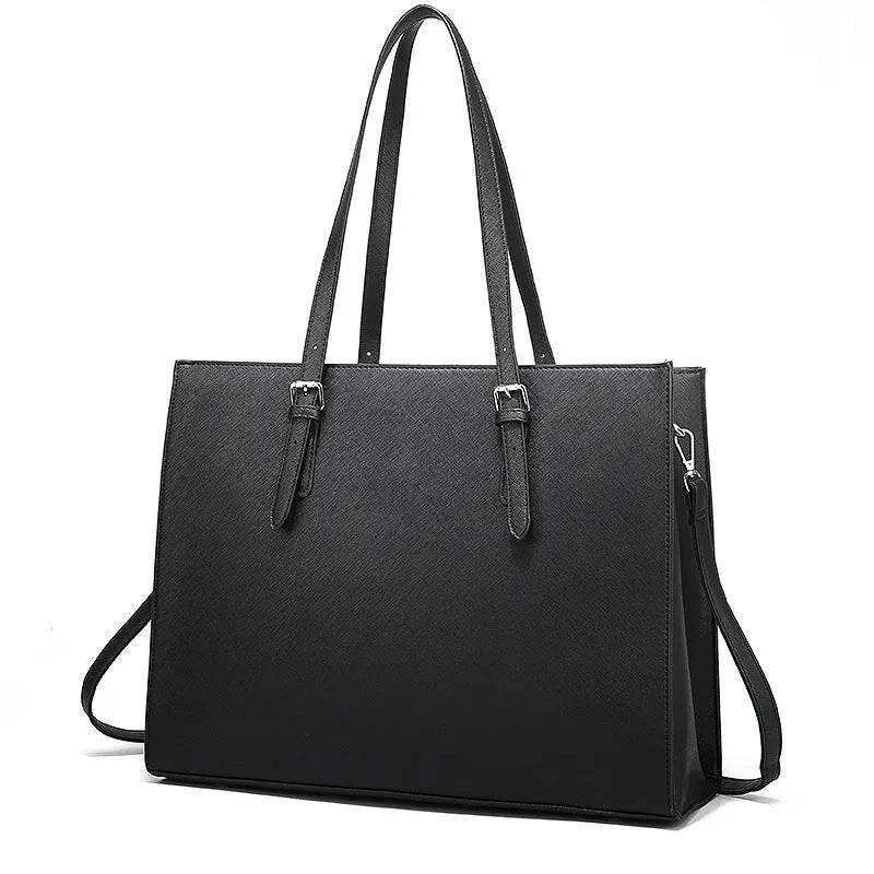 Large black business laptop bag showing multiple internal organisers and three shoulder strap options for women's daily commuting