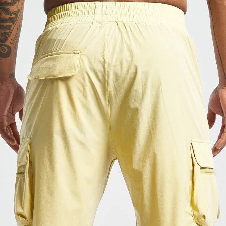Men's black fitness shorts with four-way stretch and quick-dry fabric for running and gym workouts