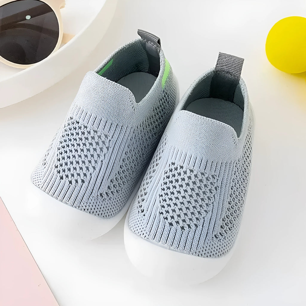 Baby soft sole non-slip walking shoes in breathable fly woven cotton cloth with natural rubber sole, multiple colours