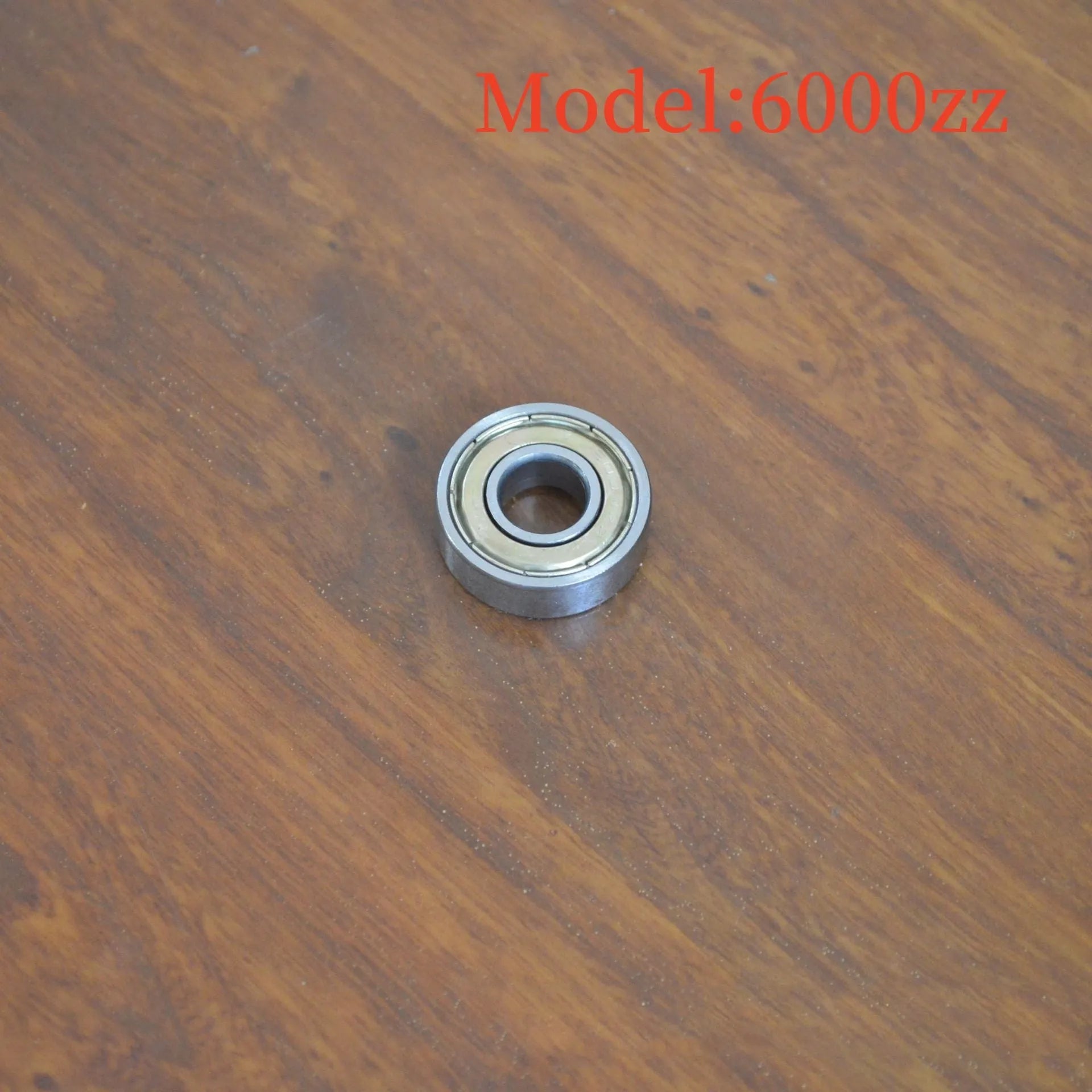6000zz carbon steel deep groove ball bearing with 10mm inner diameter, 26mm outer diameter, and 8mm width.