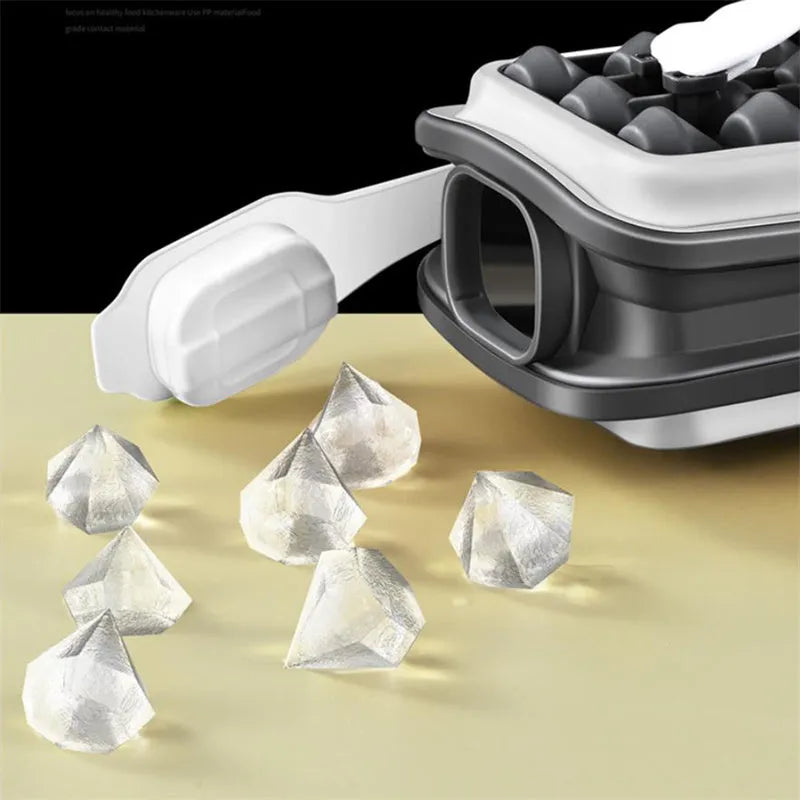 Light grey 2-in-1 silicone ice ball mould and water bottle with lid, showing portable design.