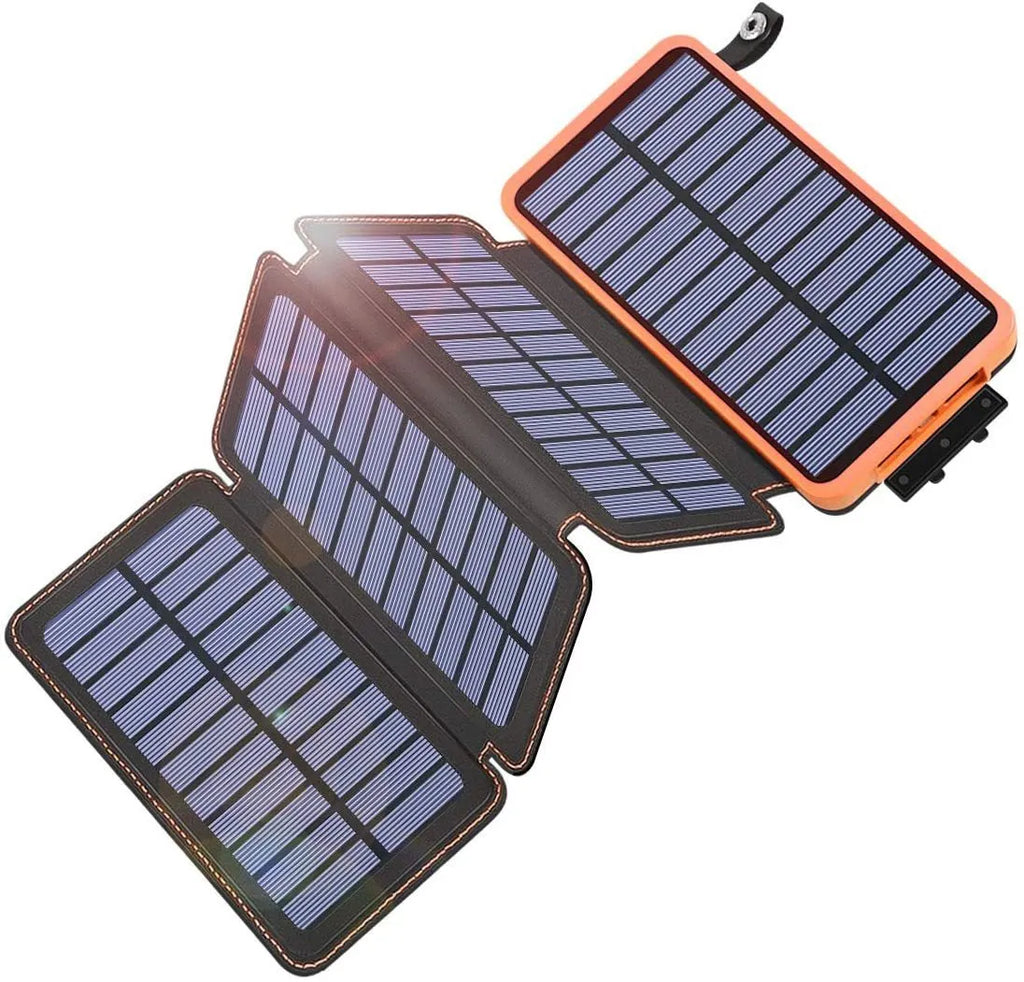 Black outdoor solar power bank with leather finish, showing solar panel and USB ports, next to a charging cable.