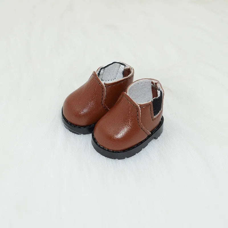 A pair of polyurethane doll shoe accessories for a 17cm figure, shown in a selected style and colour.