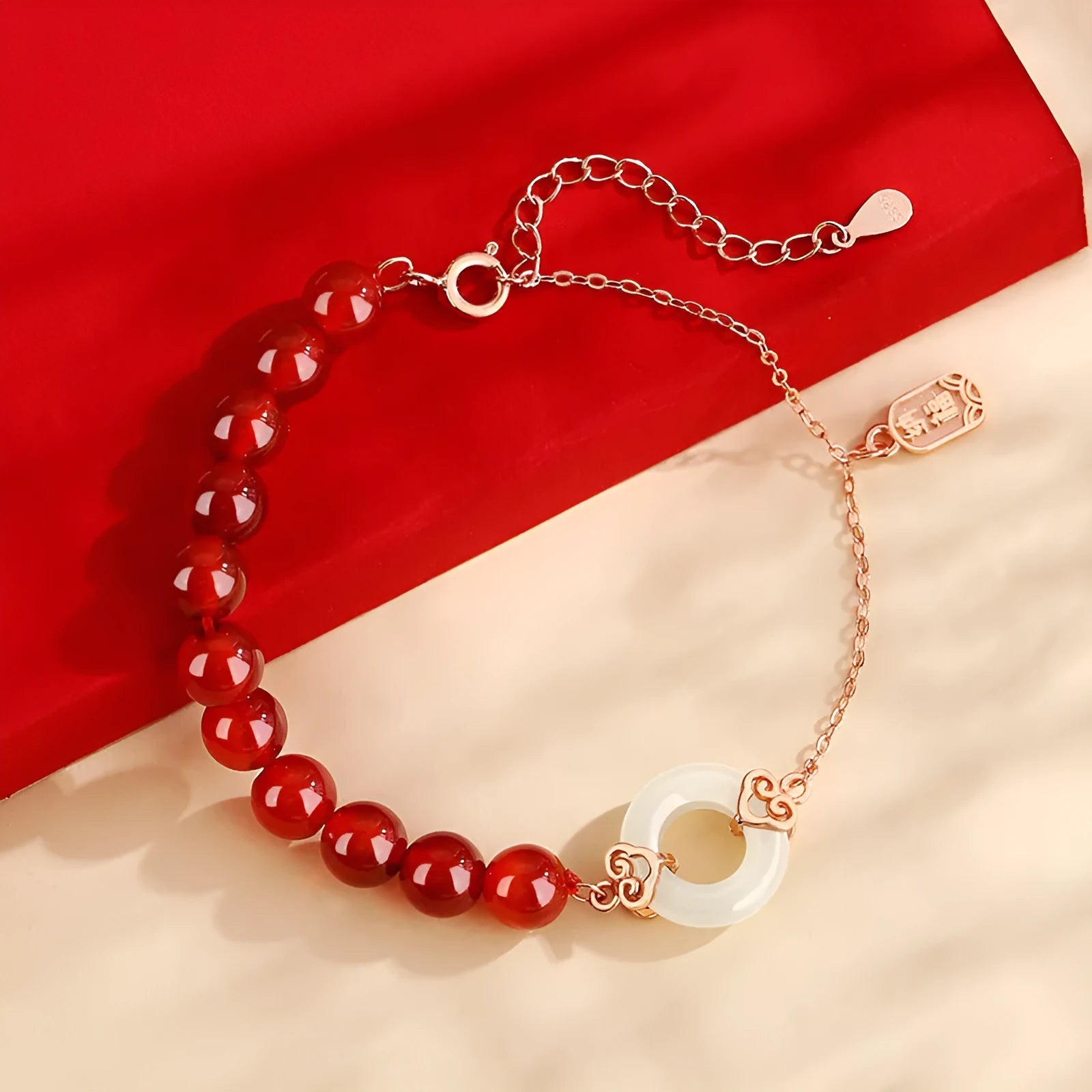 Women's sterling silver 925 bracelet with peace buckle, xiangyun, and fu character charms.