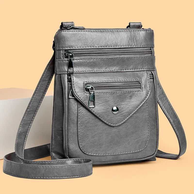Vertical square-shaped crossbody phone bag in PU leather available in four colours