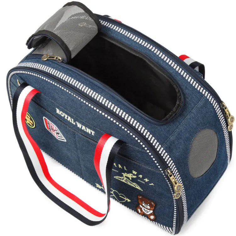 Blue denim pet diaper bag with cartoon pattern, dimensions 43cm by 20cm by 30cm