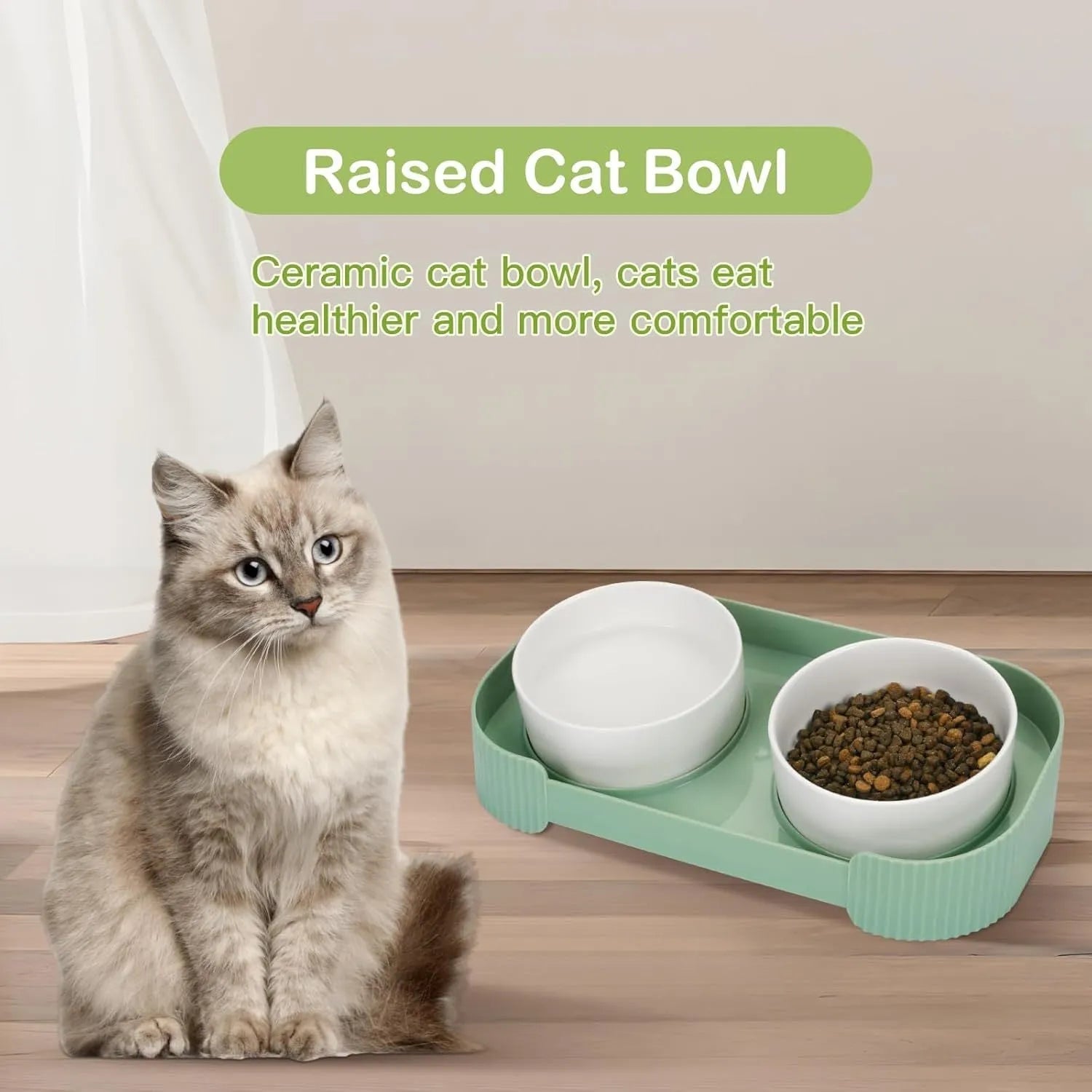 Green ceramic elevated cat feeder with two tilted bowls on a non-slip stand