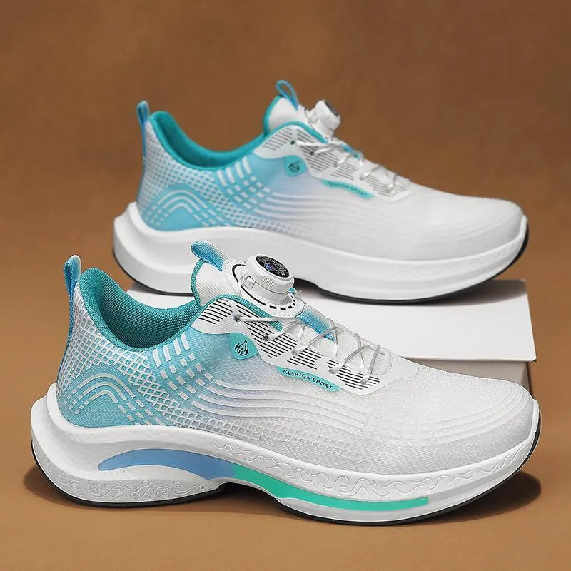 Men's white and orange mesh low-top sneaker with a rotating buckle closure and rubber sole.