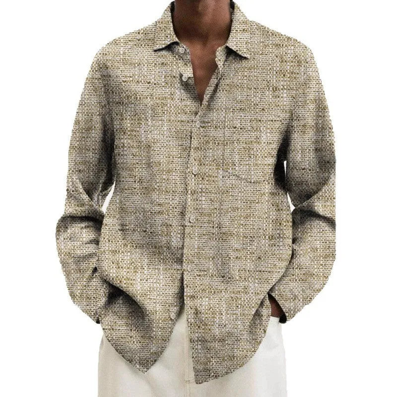 Man wearing a long sleeve patterned cardigan in a multi-colour design, showcasing its elastic polyester fabric.