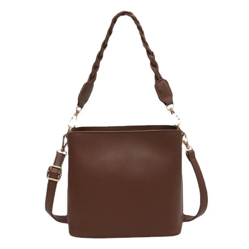 Retro one-shoulder crossbody bucket bag in woven PU material, shown in khaki colour.