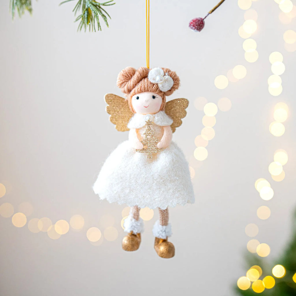 Pink and white cloth Christmas angel wings plush pendant decoration on a neutral background.