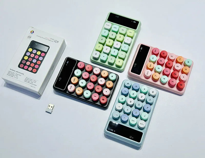 Q3 wireless mini keyboard in Macaron colours on desk