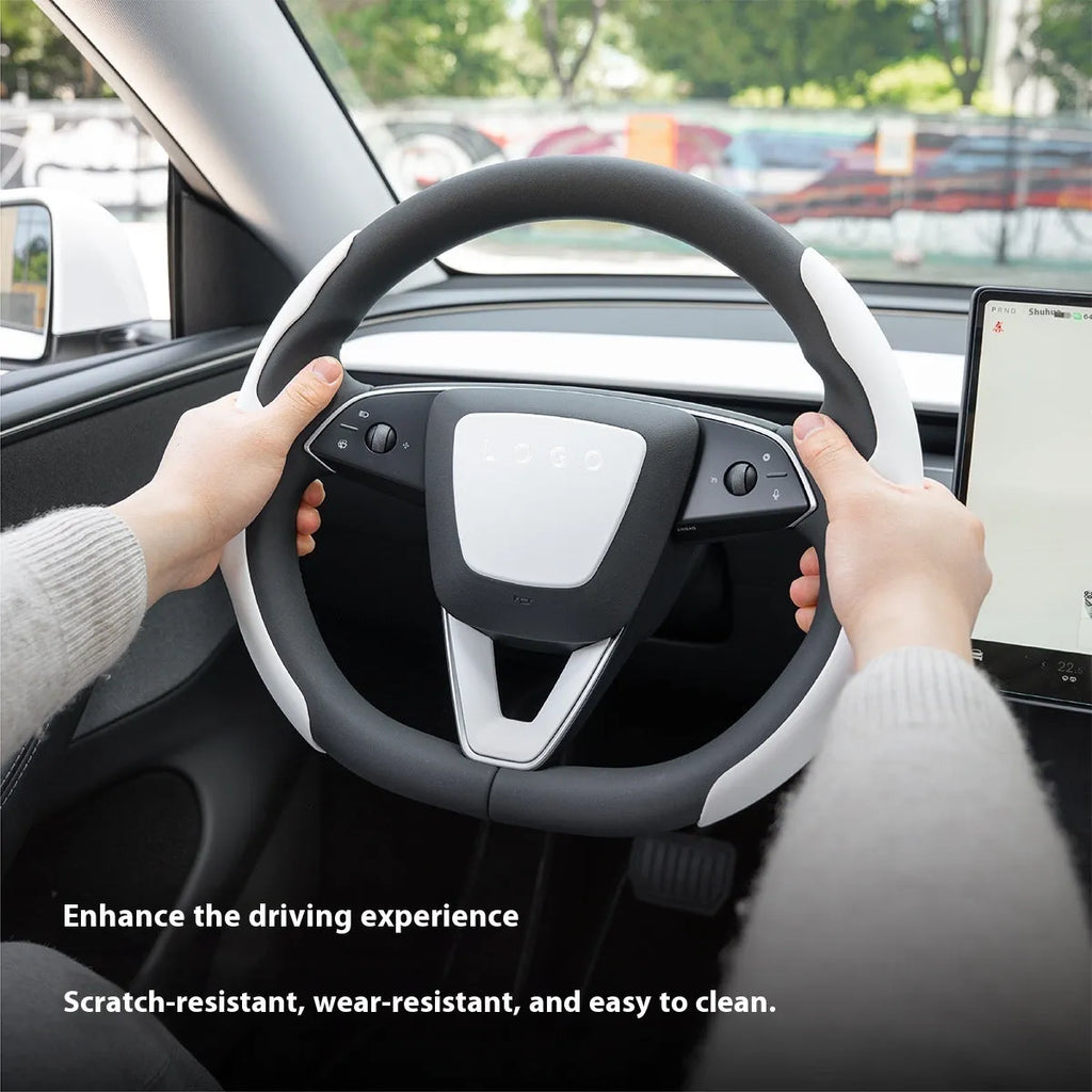 White plastic steering wheel protective patch on a car steering wheel.