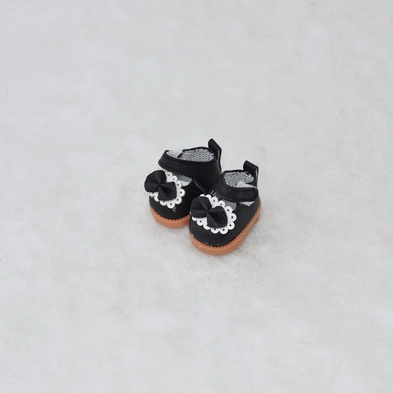 A pair of polyurethane doll shoe accessories for a 17cm figure, shown in a selected style and colour.