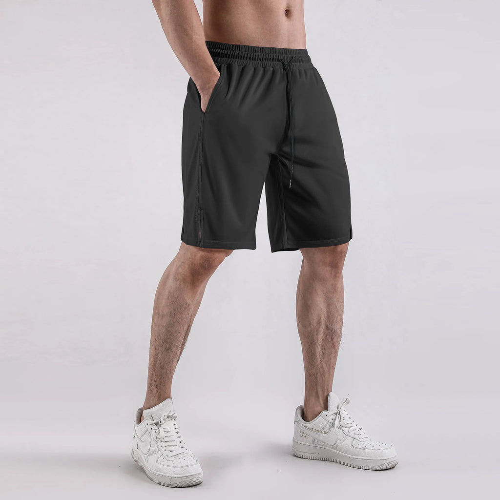 Men's black loose-fit quick-drying mesh casual shorts on a white background.