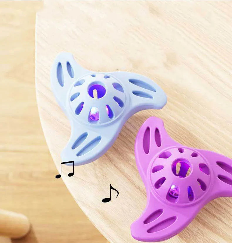 Blue or purple bite-resistant boomerang dog toy for medium and large breed chewing and fetch play.