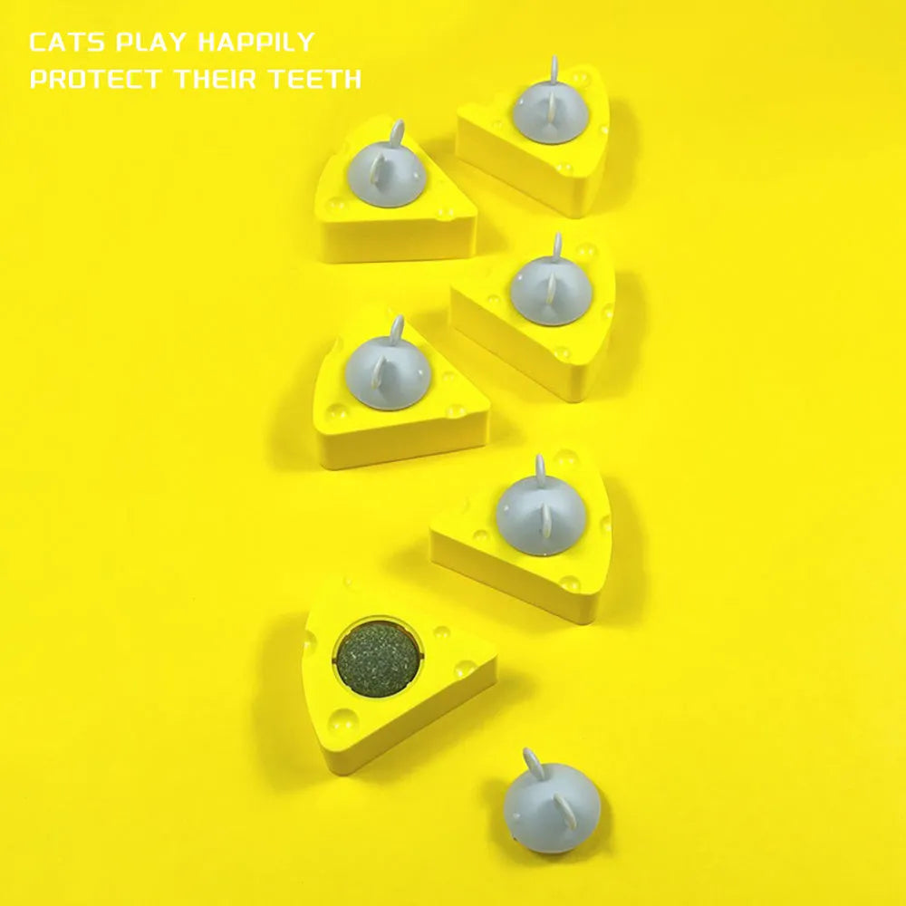 Yellow cheese-shaped cat toy ball with natural catnip and silvervine for chewing and play