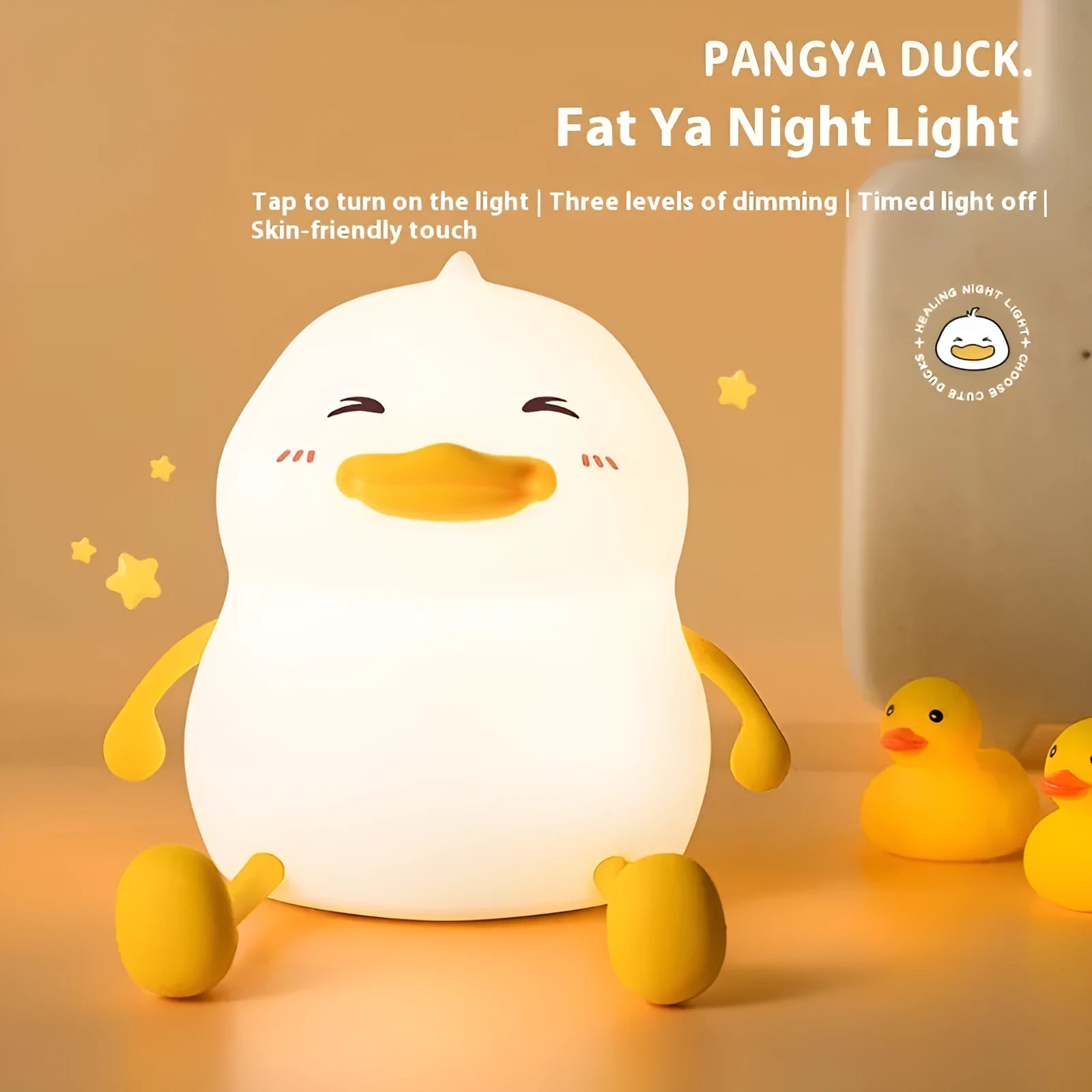 Chubby white USB rechargeable LED night light on a desktop, showing its compact size and soft glow.