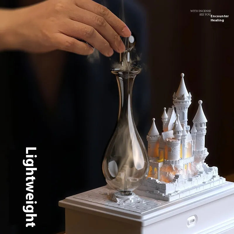 White Medieval Castle ornament aromatherapy machine with ambient light, showing size and detail.