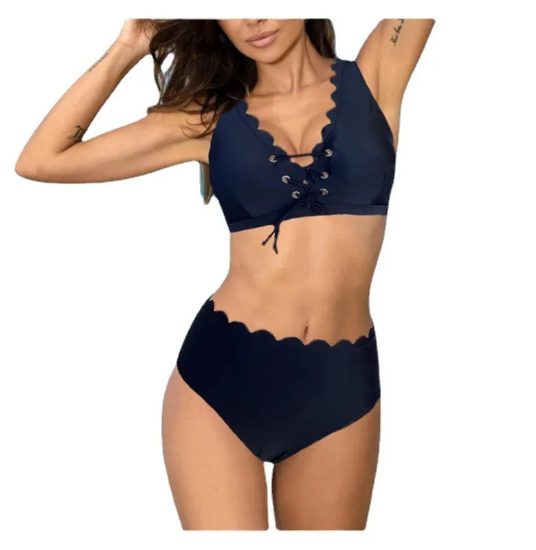 Women's red high waist split swimsuit with gathering detail on a mannequin.