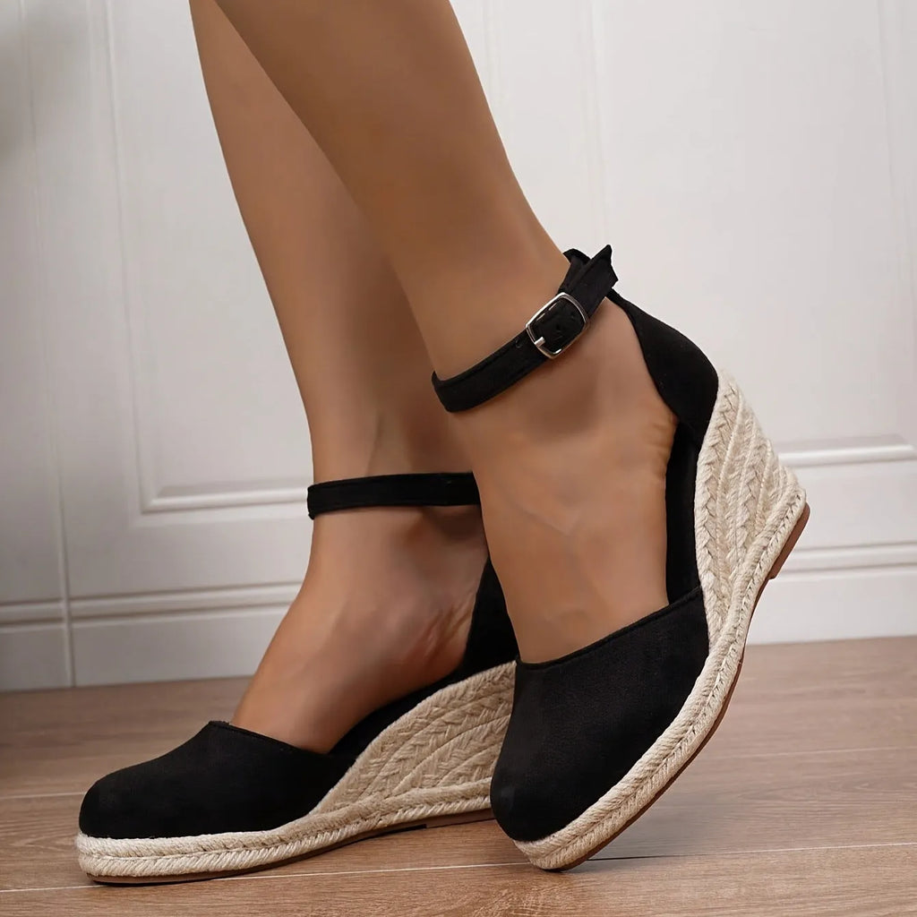 Women's apricot suede and canvas wedge sandals with a buckle strap.