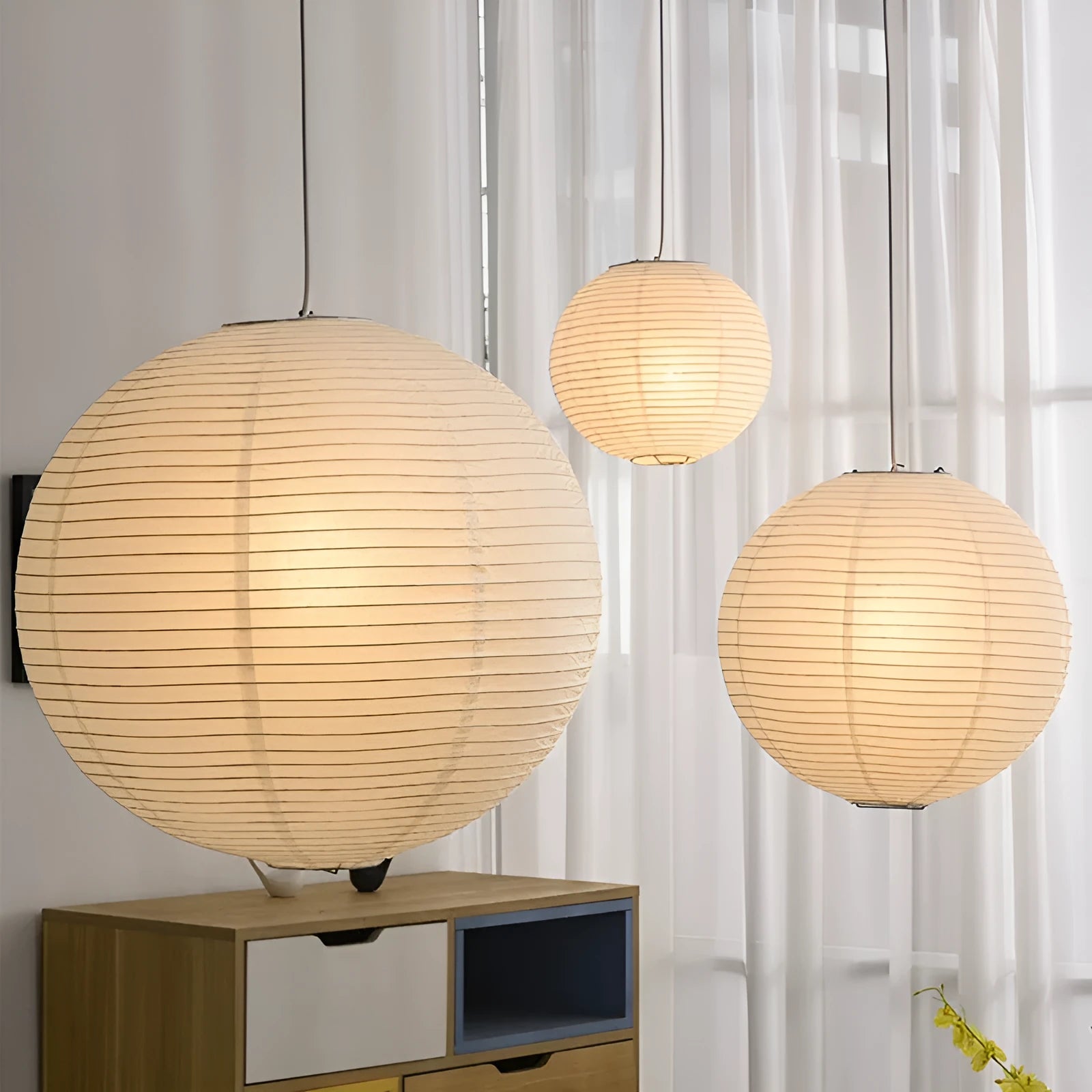 Modern paper chandelier pendant lamp in three diameter sizes with three colour lighting