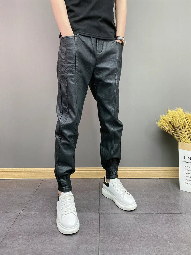 Black waterproof windproof casual rider motorcycle tapered pants with artificial leather lining and mid-rise waist