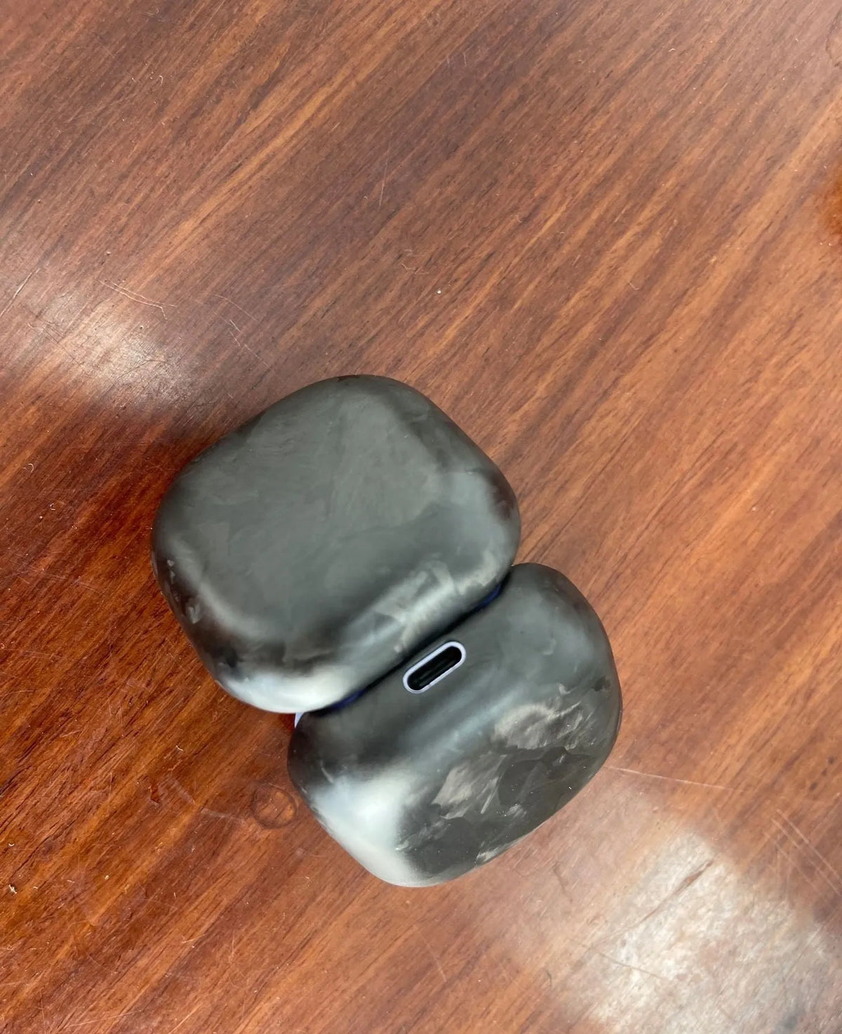 Carbon fiber moulded protective cover for Apple AirPods Pro in a twill bright finish
