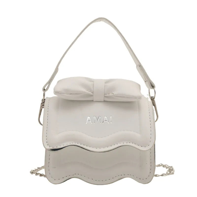 Mini crossbody bag in seven colour options with single shoulder strap