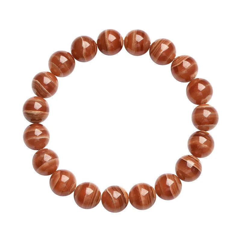 Natural old mine rhodochrosite round bead bracelet from Peru with ruyi charms.