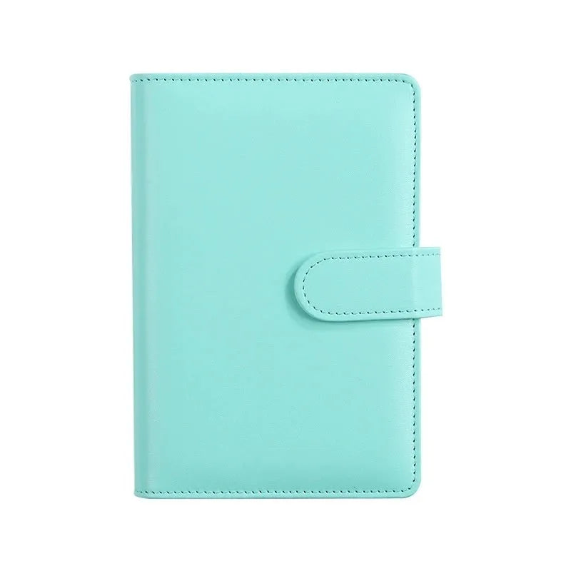 Solid colour A5 PU leather zippered loose-leaf binder notebook shell on a desk