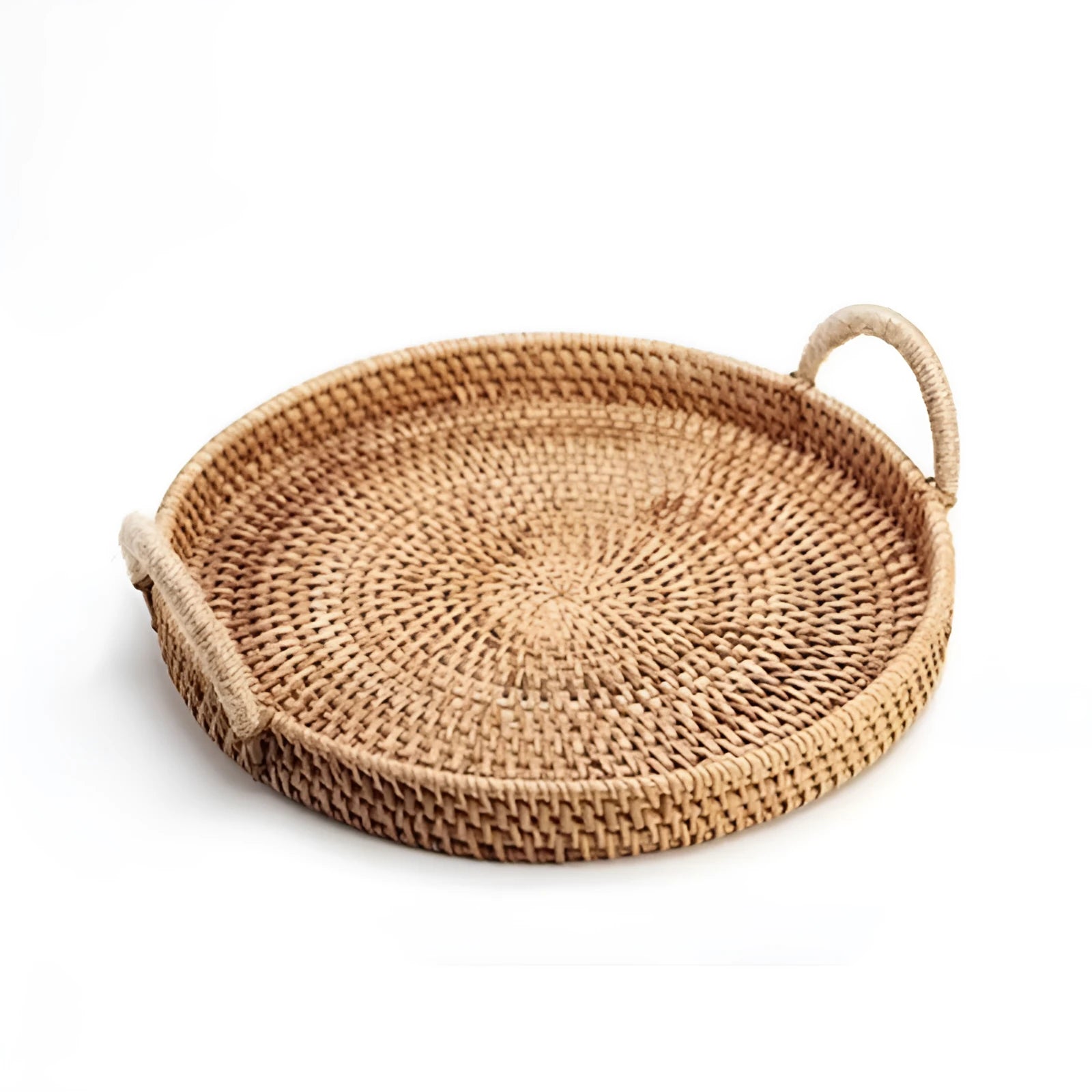 Round handwoven rattan storage basket with a wooden handle on a table.