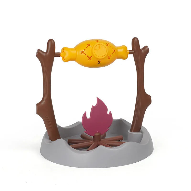 Barbecue-themed tumbling cat food feeder toy with treat dispenser, shown next to dry kibble.