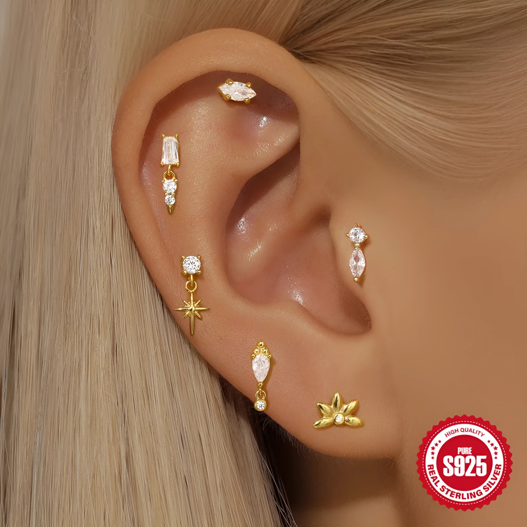 Sterling silver tassel ear studs with gold electroplating and XINGX inlaid detailing