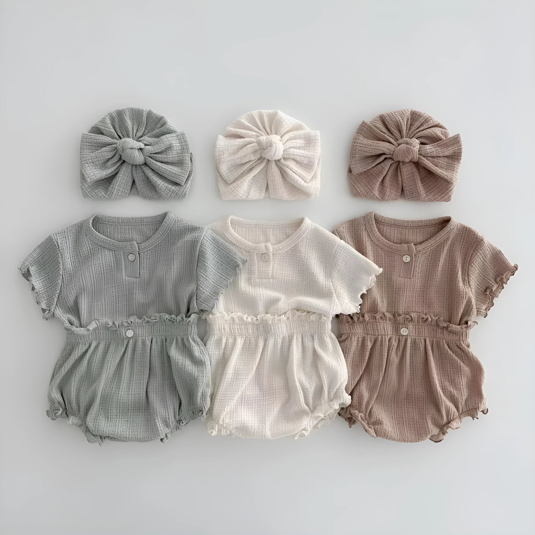 Cotton baby two-piece set with short sleeve top and shorts in light pink