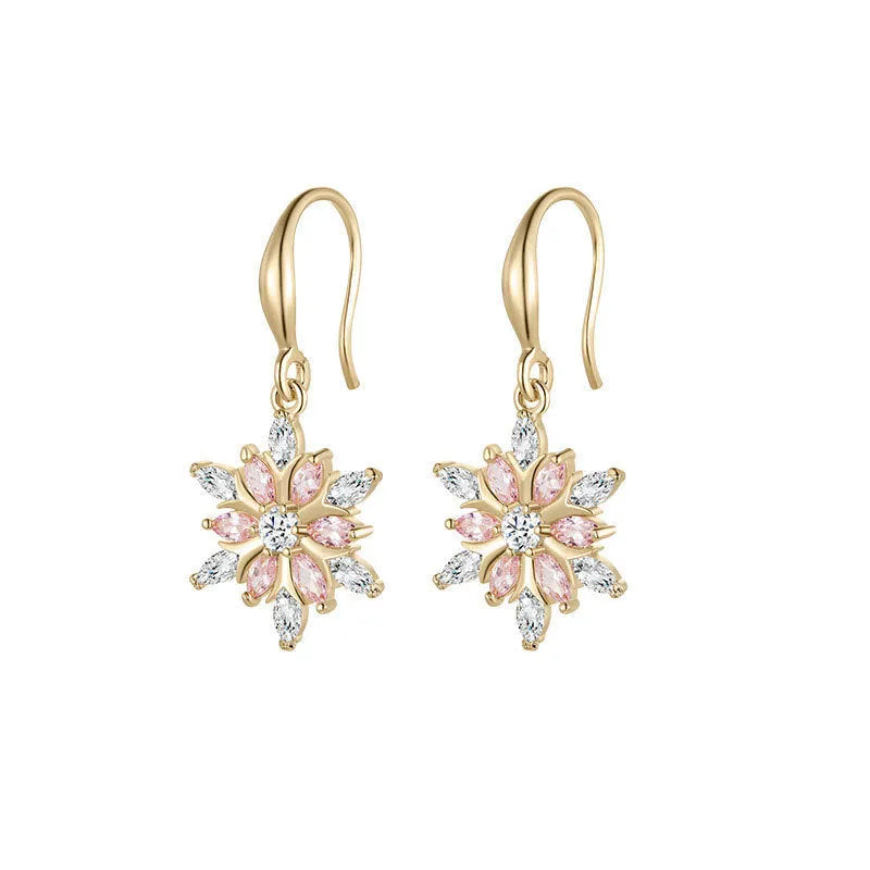 Gold alloy snowflake earrings with central zircon stone for women