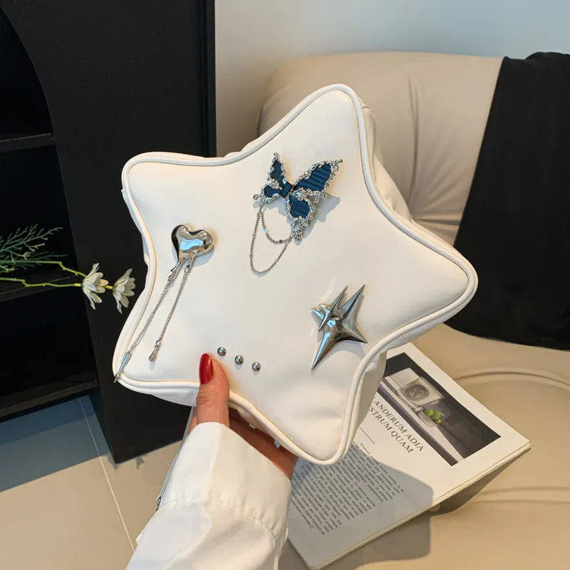 Black PU leather decorative backpack with metal butterfly love pendant and five-pointed star, chain strap.