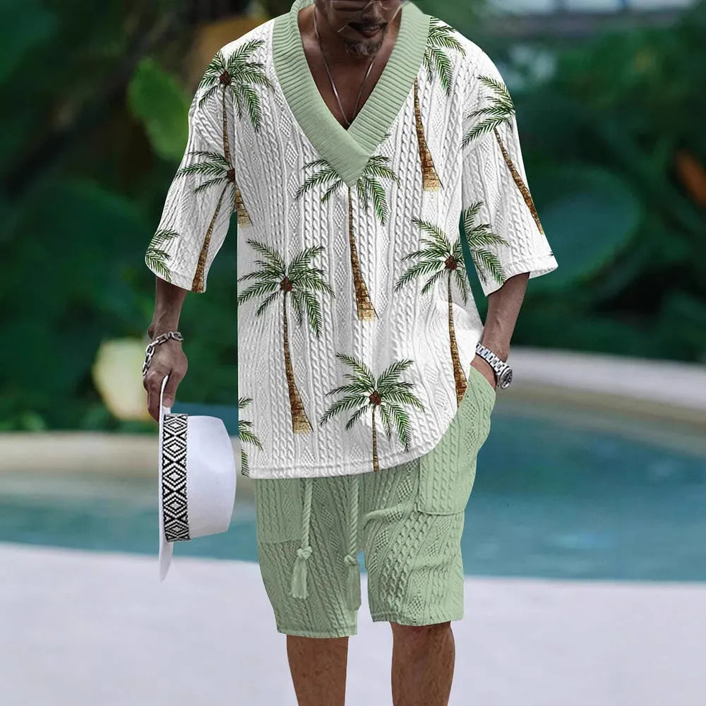 Loose casual short sleeve suit set in a light colour, showing the top and matching shorts laid flat.