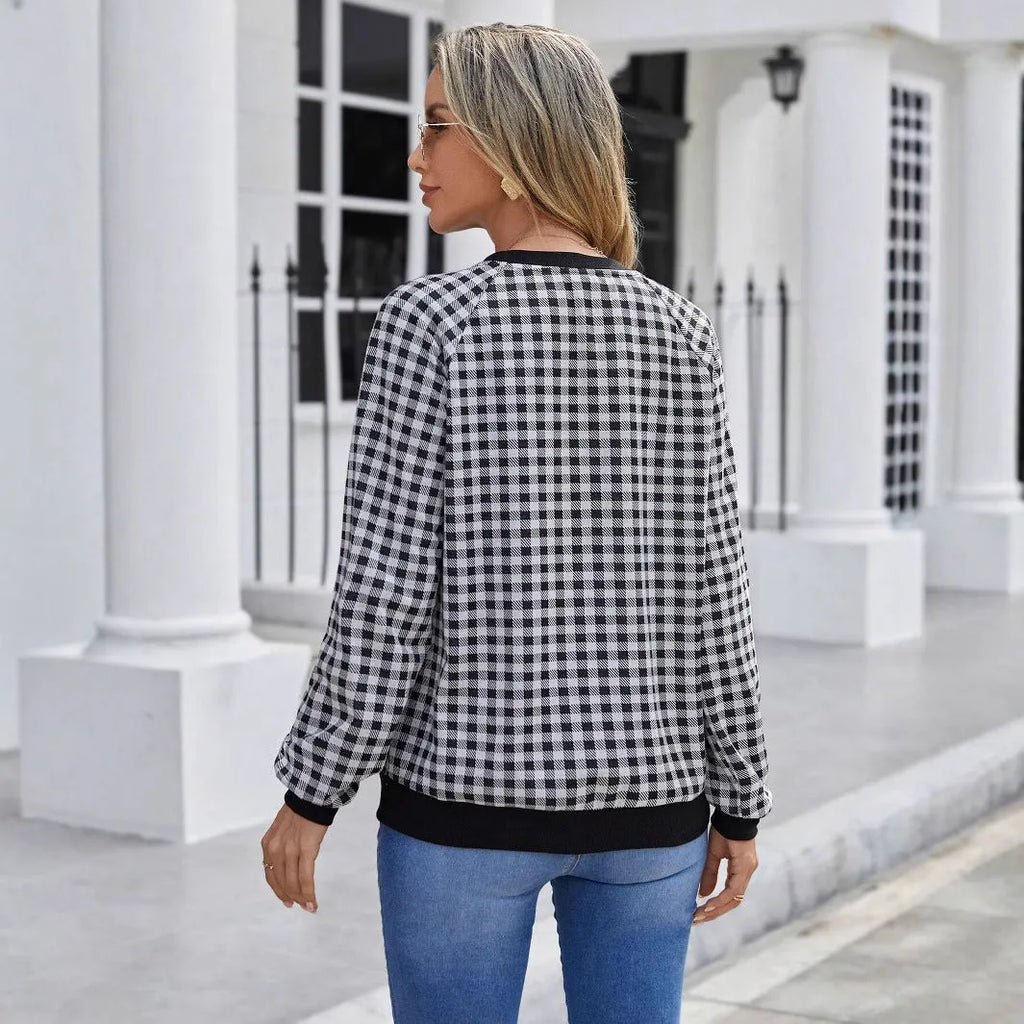 Black Japanese plaid pattern pullover sweater with long sleeves and printed stripes