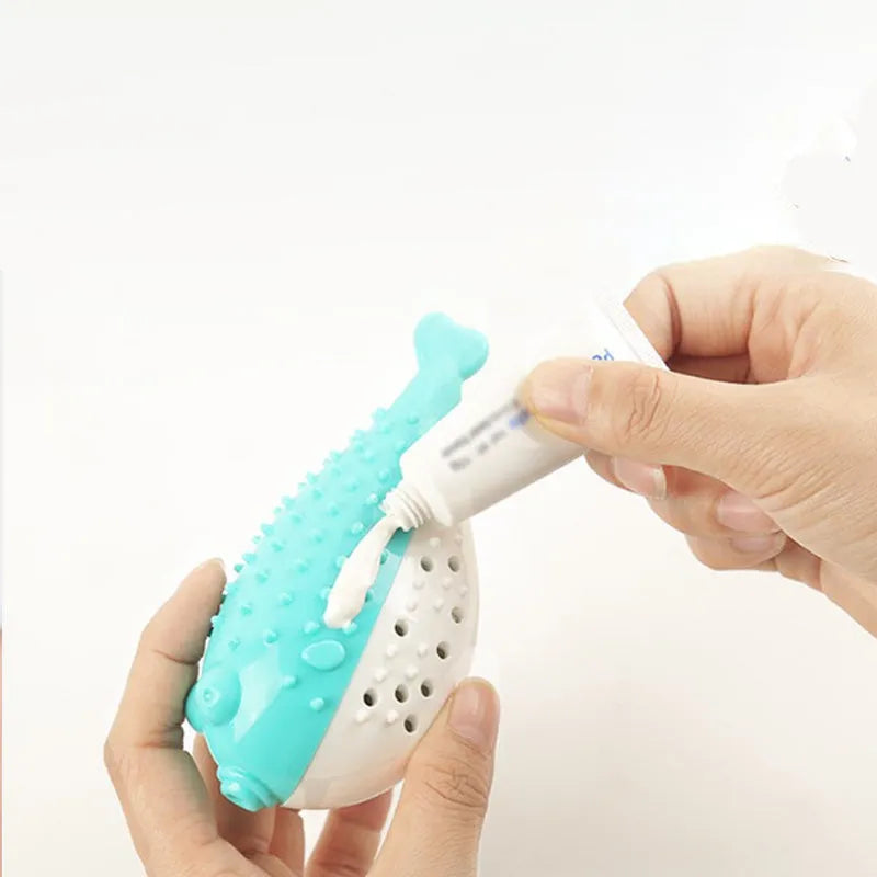 Blue silicone fish-shaped cat chew toy on a white background.