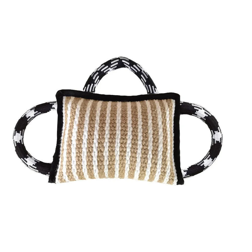 Jute dog tug toy with three rope handles and a central bite pillow for interactive play.