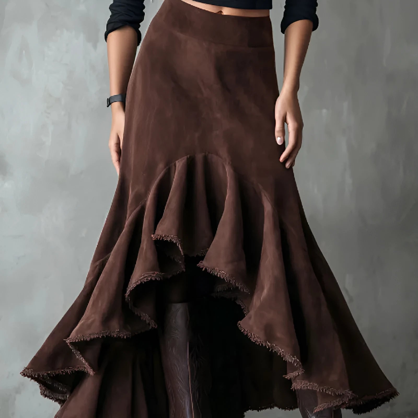 Brown high-low ruffle maxi skirt on hanger showing asymmetric hemline