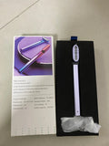 Micro current introduction eye massage instrument in green, with RF gear and USB charging cable on a white background