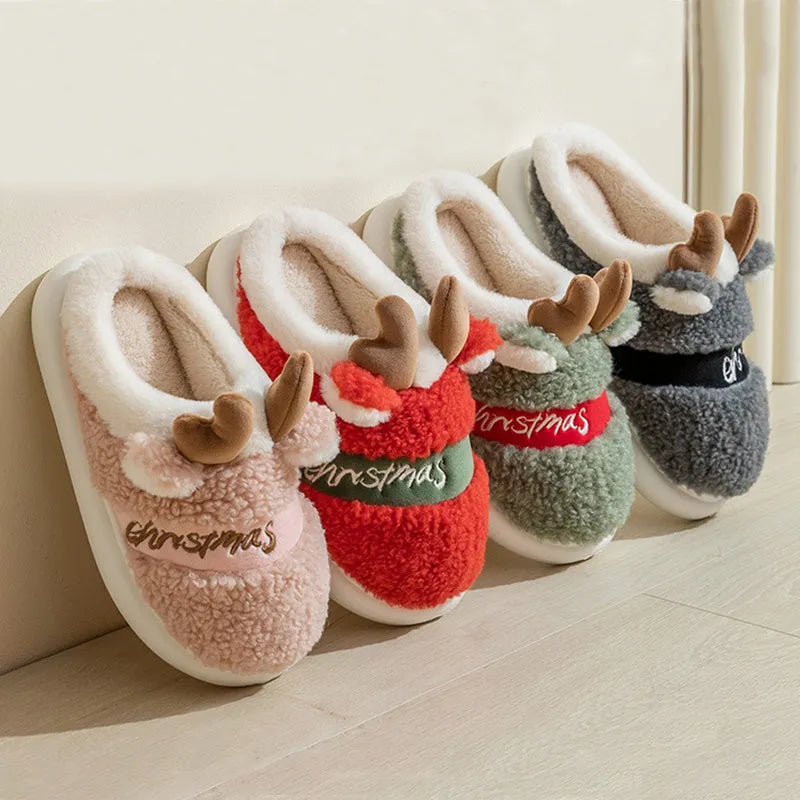 Christmas elk winter home slippers in pink with suede upper and thickened EVA sole on a cream background