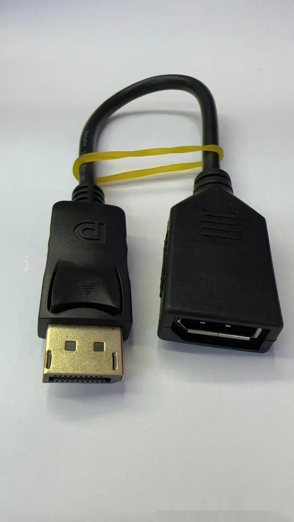 Black DisplayPort DP male to female extension cable with rotating connector, approximately 10cm length