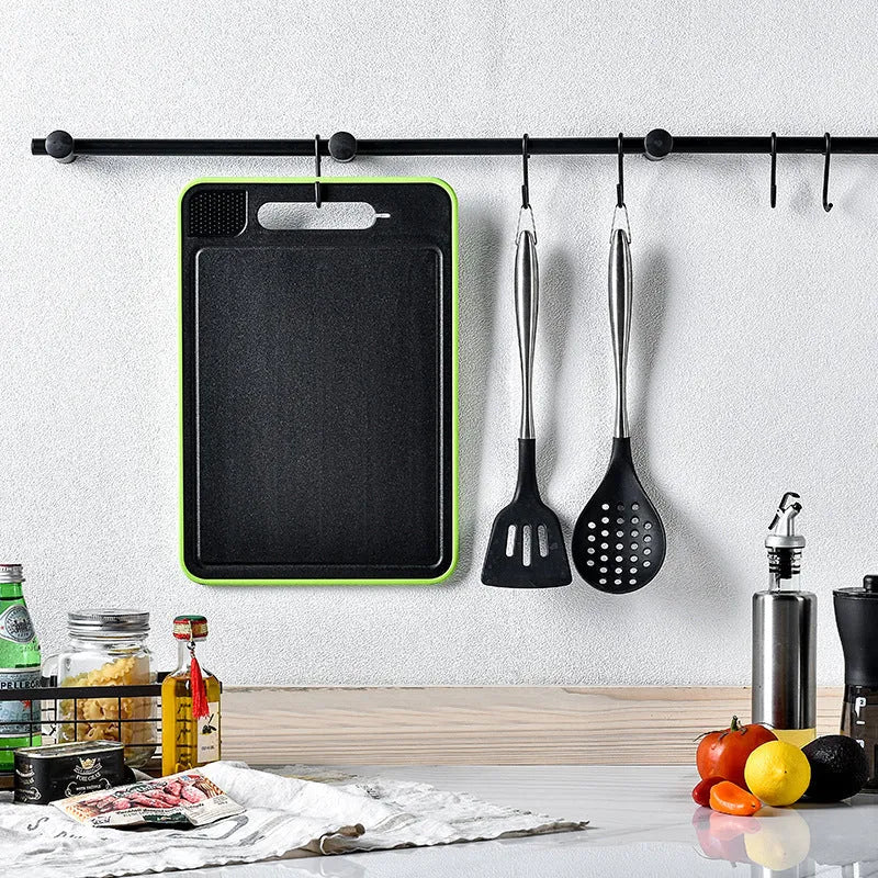 Grey square aluminium cutting board with double sides, grinding teeth and built-in knife sharpener