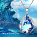 Blue alloy love heart pendant on a women's necklace chain.